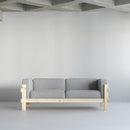 Kube Sofa 3 posti con telaio in pino in ambiente
