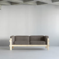 Kube Sofa 3 posti con telaio in pino, vista laterale in ambiente