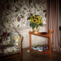 Museum Trolley STRING arancione in ambiente