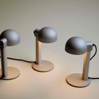 Posto Table Lamp HAY su libreria