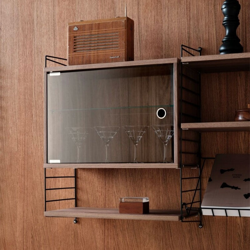 Display cabinet with swing glass door